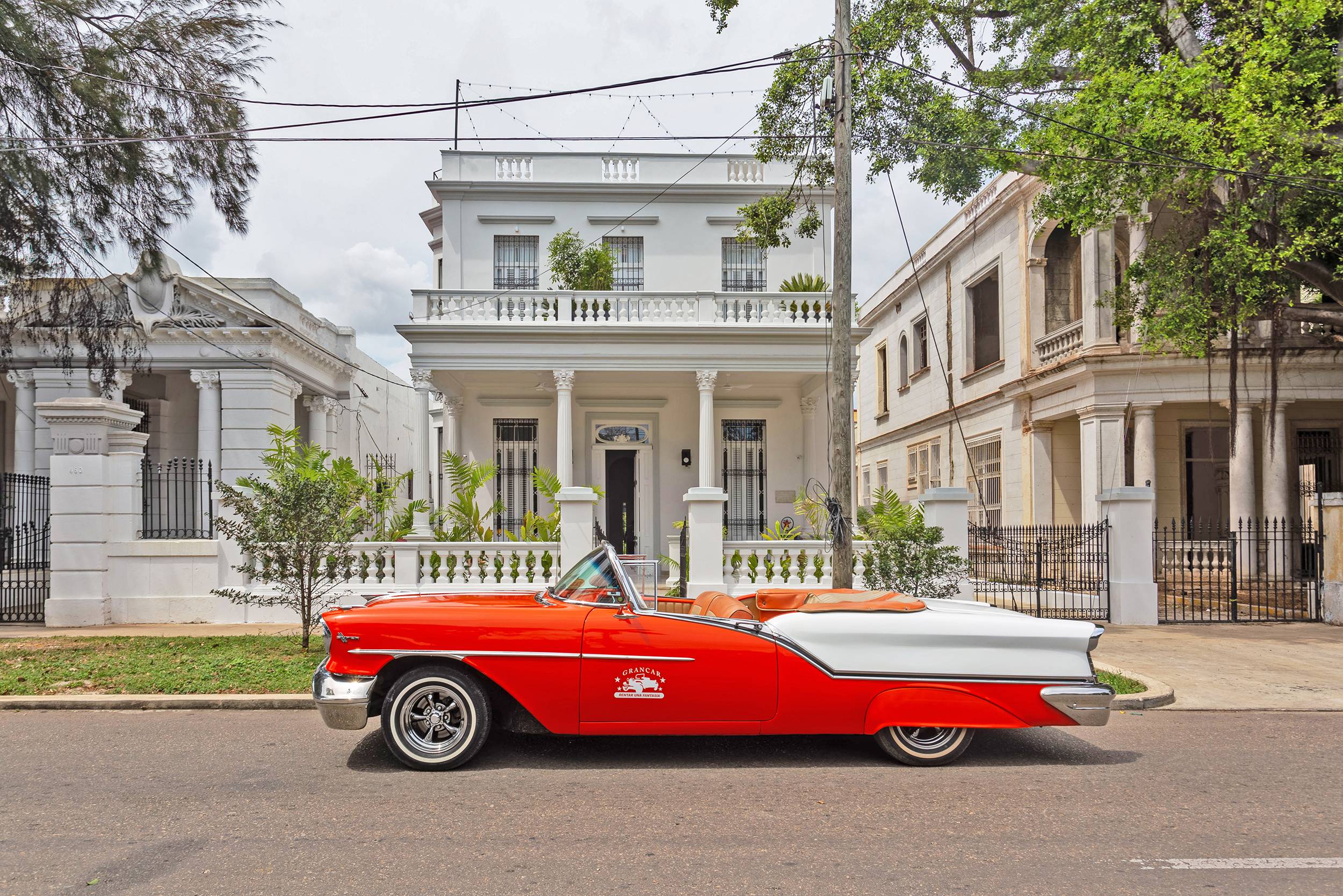 classic american car elegant colonial house